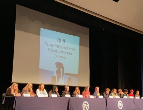 All 14 future collegiate athletes sign their letters of intent on November 26, 2019. 