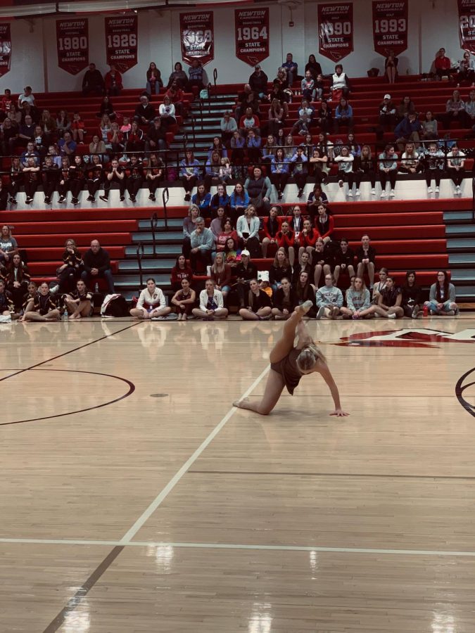  Freshman Josie Kaffenberger performs her first place dance at the Iowa state solo dance competition. 
