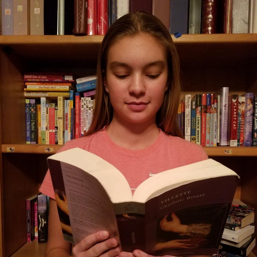 Junior Morgan Miller reads a book for fun to improve her vocabulary and relieve stress.