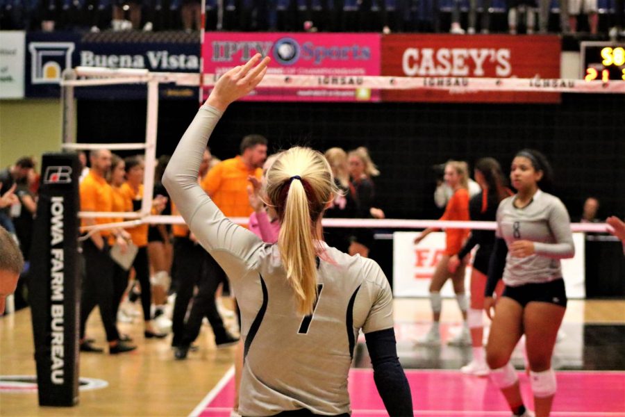 Emily Wood waves to the student section after their loss to West Des Moines Valley.