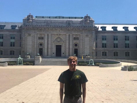Will Rolfstad stands in front of the United States Naval Academy.