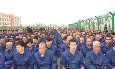 Muslim detainees listen to speeches in a camp, taking place in Xinjiang, China.