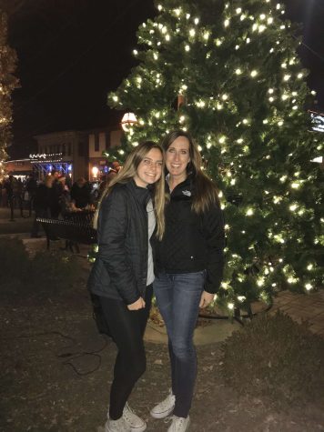 Junior Raegan Stein enjoys the holiday season with her mom at Christmas in the Village.
