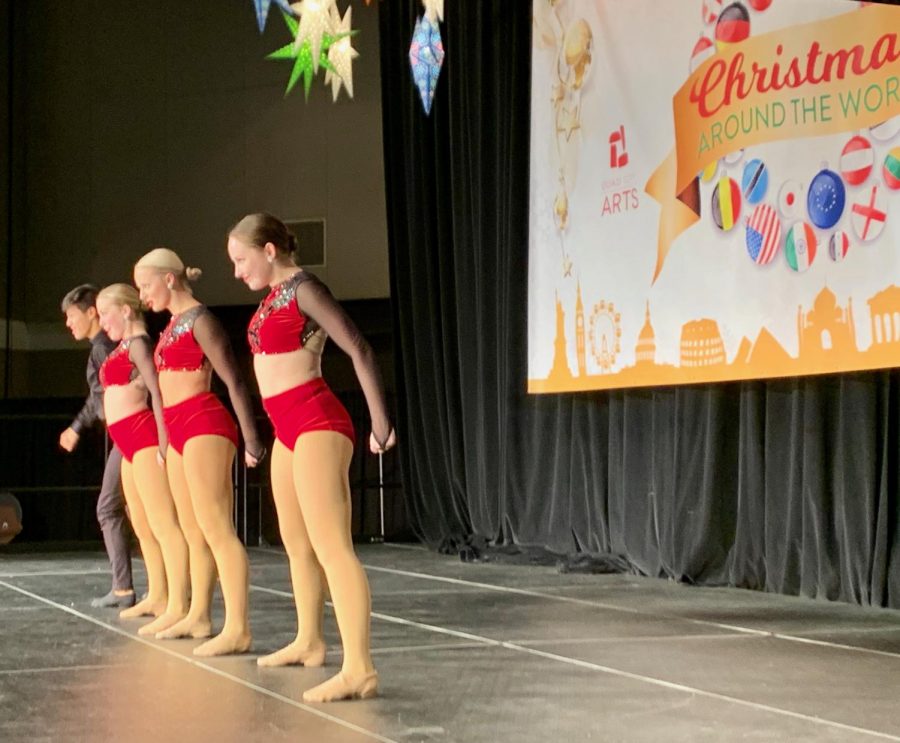 Junior Kaitlyn Christ perform excerpts from “The Nutcracker” at on the main stage of Festival of Trees. As seen in the background, the theme for this year’s festival was Christmas around the world.
