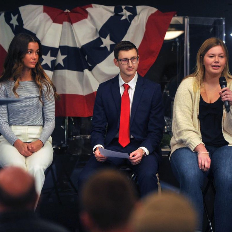 Republican Teenage Campus Leaders, Olivia Schilling (left), Ben Crawford (middle) and Grace Thalacker (right) voice their opinions at the immigration forum in the Pleasant View Baptist Church on Monday.