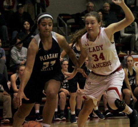Player of the week Ilah Perez makes an offensive play against the North Scott Lady Lancers.