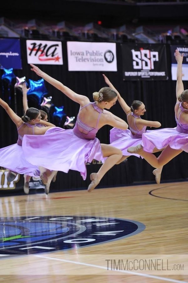 Noel Pearson leaps through the air during a state dance routine in 2018. 