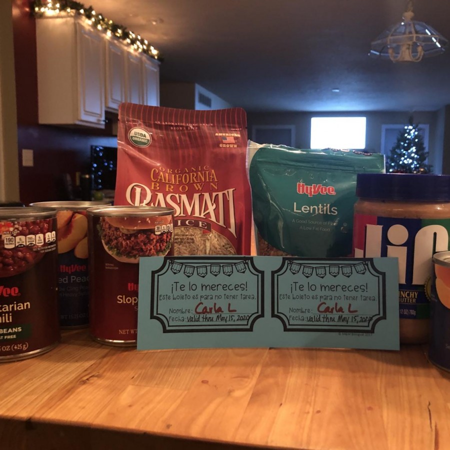 Various food items that could be donated to worthy causes such as the Student Hunger Drive with a “homework coupon” used as a reward for this service.