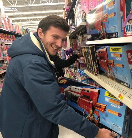 Senior Sam Necker makes a trip to Walmart to gather toys for children in need this holiday season. 