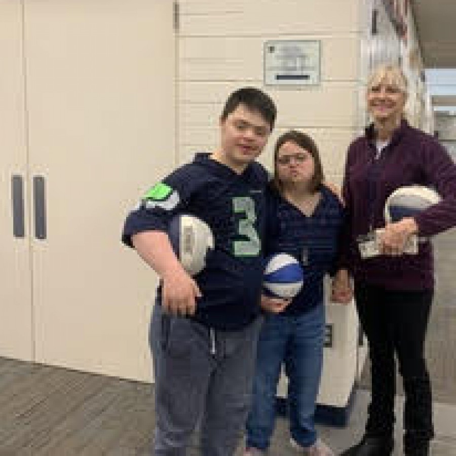 Meadows with two of her students. Freshman Christian Mali and Junior Rachel Wanke both gave a thumbs up to Meadows.