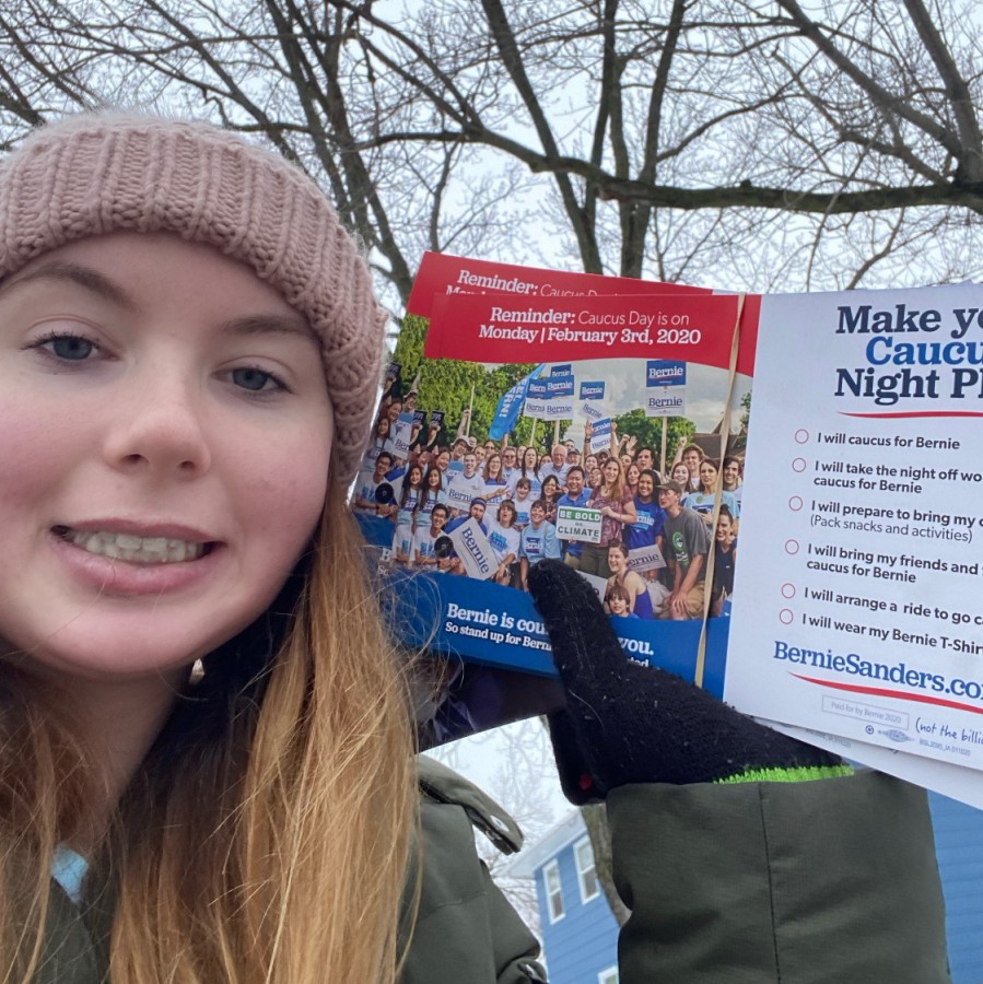 Amy Oberhart attempts to rally potential caucus voters in support of Bernie Sanders by travelling through local neighborhoods.
