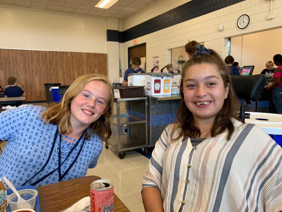 Jazzie Zupancic (left) and Madi Ramirez (right), the newest members of the PVJH Swim Team, enjoy lunch together at the junior high.