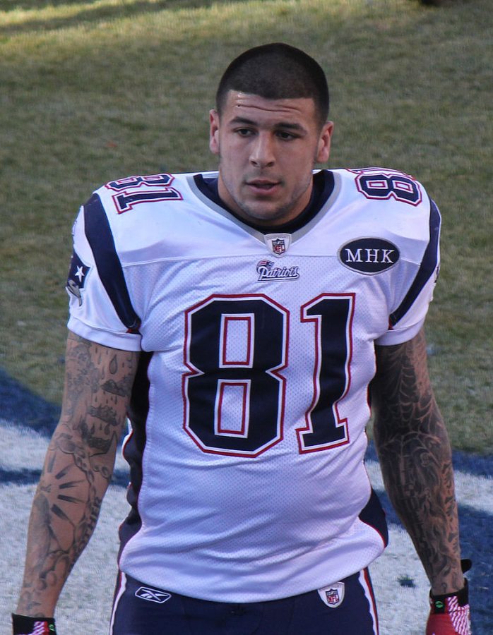 Aaron Hernandez walks off the field at a game in 2011.