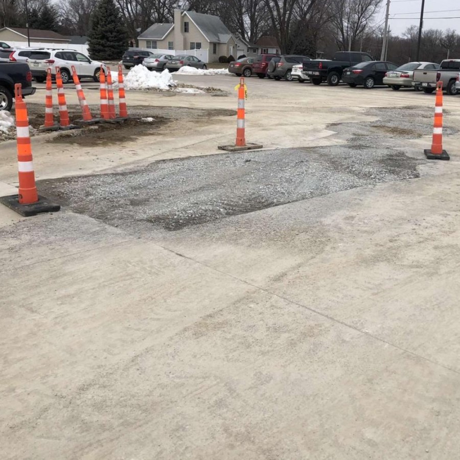 The location in the D lot where the pipe burst.