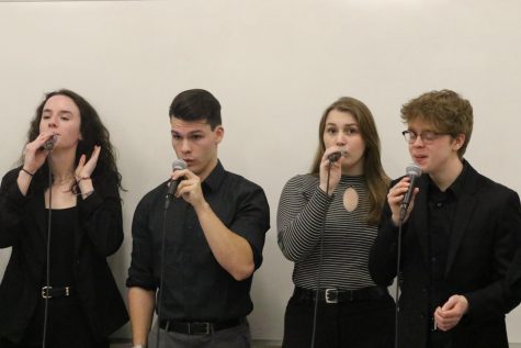 Members of the Leading Tones record one of their song submissions for their audition to be selected for the 2020 Iowa Vocal Jazz Championships 