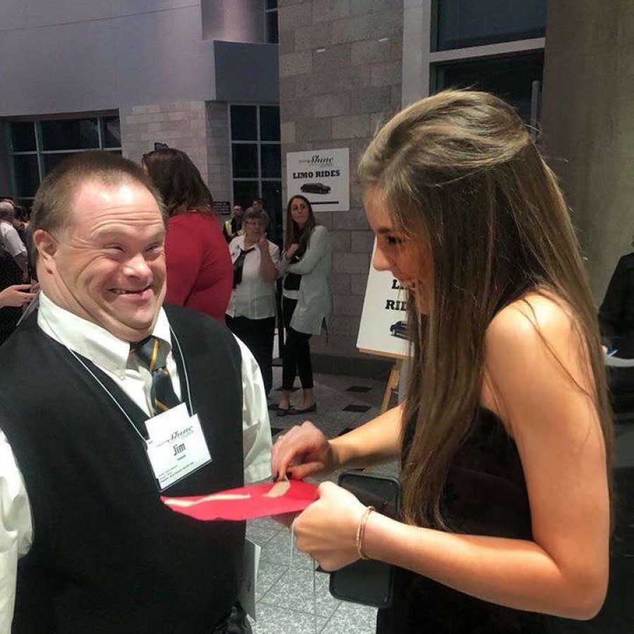  Senior Grace Halupnik getting ready for the night with her buddy Jim at the Taxslayer Center in Moline.