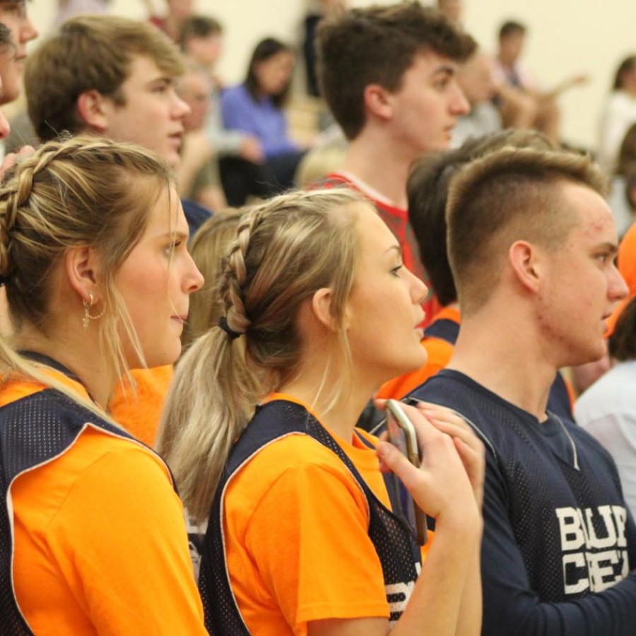  Student section members show their support for the girls basketball team during their game against Davenport Assumption on Dec. 13, 2020
