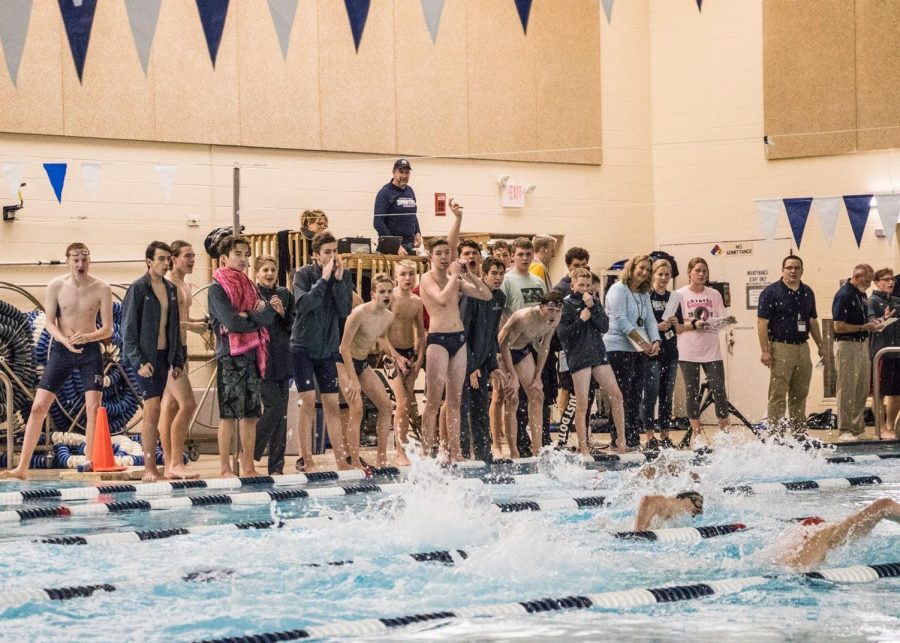 Pleasant Valley boys swim team cheers on their teammates at their home meets this season.
