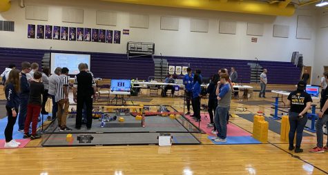 Robotics teams Flourish, Bots and Winter Soldiers competing against each other for a match at the League Championship at Central Dewitt High School.