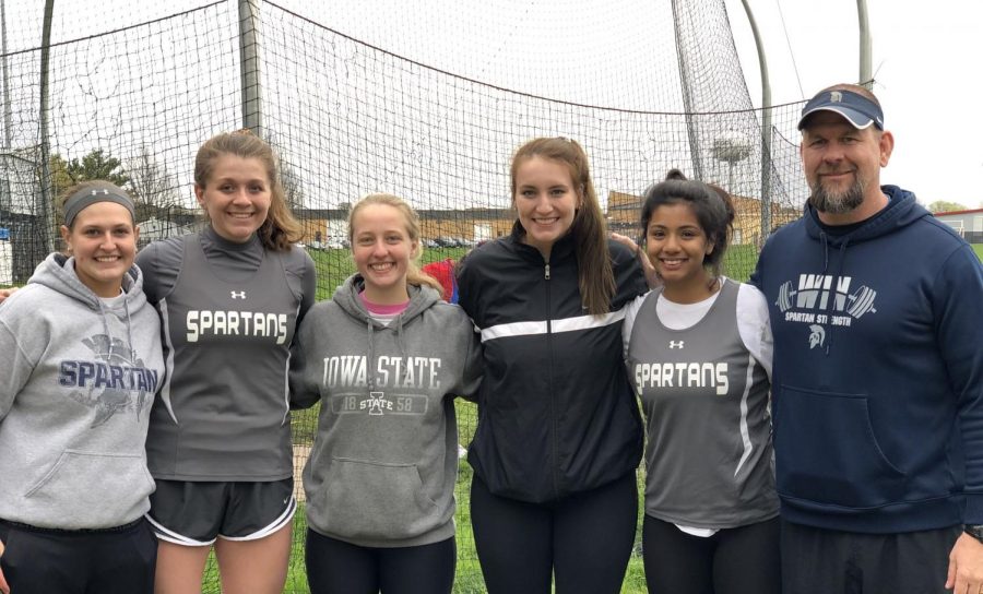 Pleasant Valley throwers and Coach Vice at the 2019 North Scott invite meet.