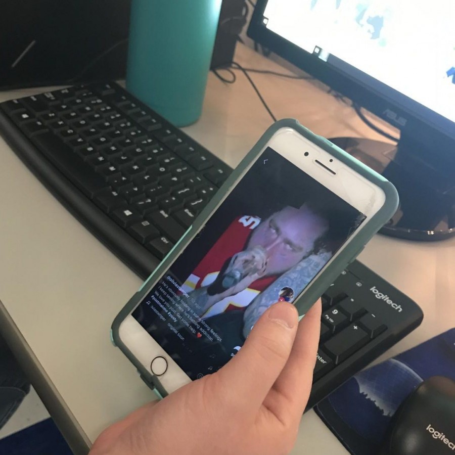 Senior Cecilia Zavala watches the TikTok of Post Malone that first went viral, showing him struggling to get up