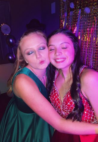 Seniors Lena Ahrens (left) and Morgan Ramirez (right) pose for a picture at their quarantine prom. 