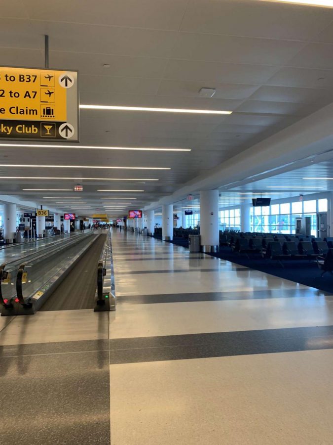 Vittoria Ripamonti walks through a nearly empty airport on her way home due to the Coronavirus.