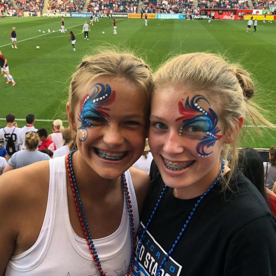 Sophomores Camryn Woods (left) and Addie Kerkoff (right) cheer on the United States women’s national soccer team at the Tournament of Nations last year.
