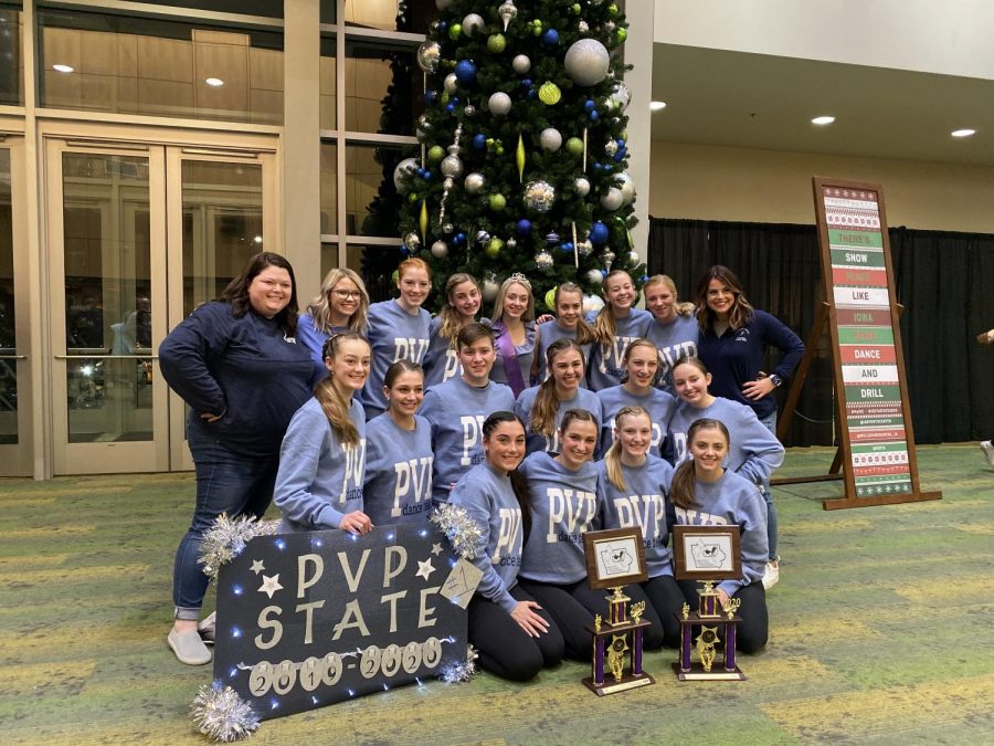 The 2019-20 Pleasant Valley Platinum holding their trophies from state.