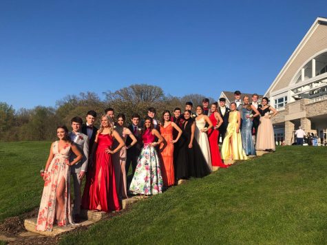 Students pose for prom pictures on May 5, 2019.