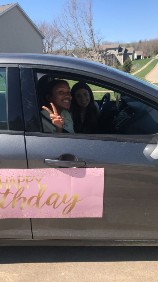 Sophomores Jayne Abraham and Claire Horsfield during sophomore Hannah Harrison’s birthday parade. 
