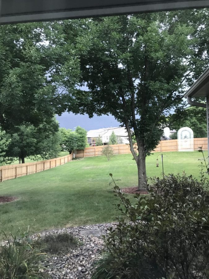 The sky darkens as a derecho storm rolls into Bettendorf, Iowa. 