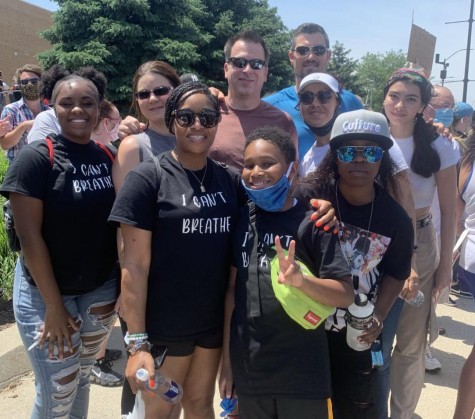 Corea Conner, at left,  attends the March to the Capitol on June 6 in downtown Des Moines with her mom, step-dad and a few new friends she met through her involvement with the Black Lives Matter movement. 