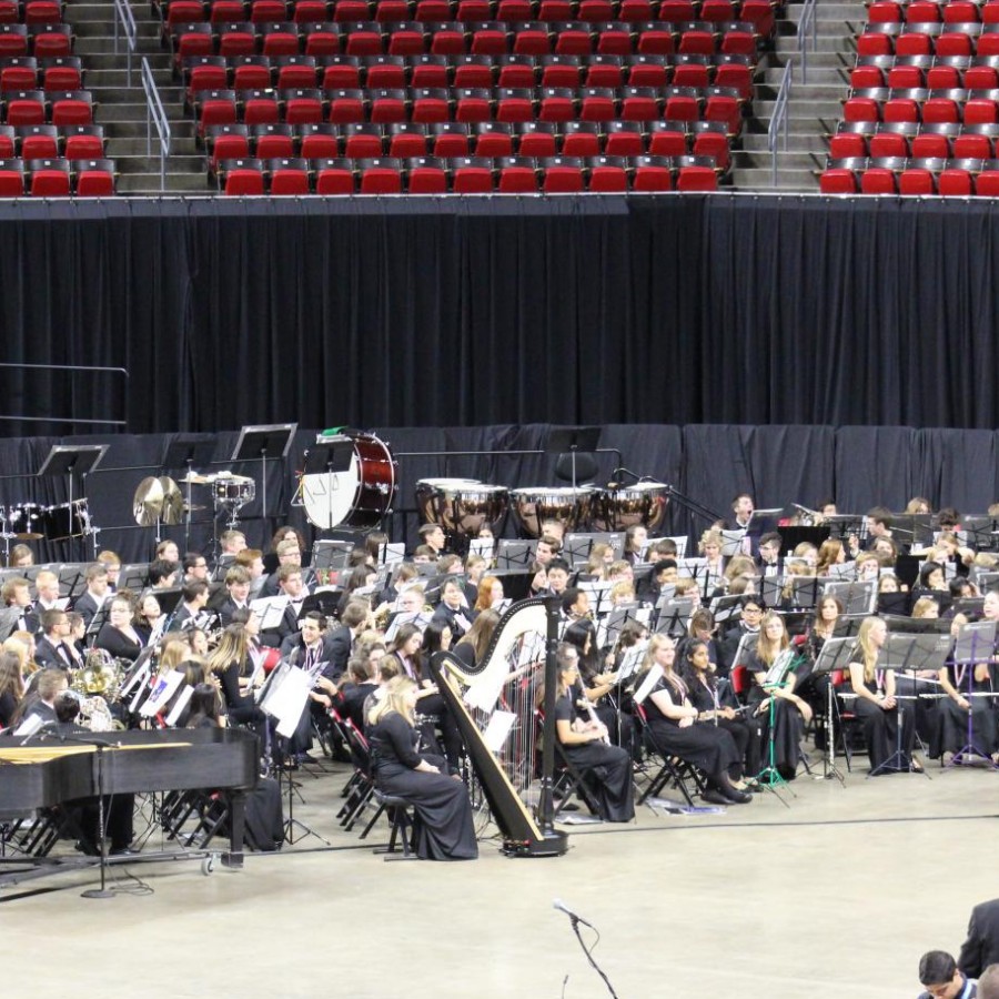 The 2019 All-State band before their performance in the Hilton Coliseum on the Iowa State Campus. Most members have been preparing for this moment for more than six months. However, with this year’s auditions being online many are concerned that audio quality and technology of recording devices may be the deciding factor to get to this moment.  
