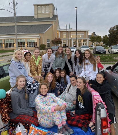 Anna Thorne and her Church group celebrate their trunk’s pajama and slumber party themed trunk from 2019’s trunk-or-treat activity. Trunk-or-treat is listed as a “moderate risk” when it comes to staying safe from COVID-19, if done the correct way. This is just one of the many activities that people can participate in while being healthy for this year’s Halloween.