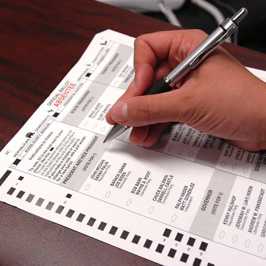 Member of the United States military fills out their absentee ballot during the 2008 election.