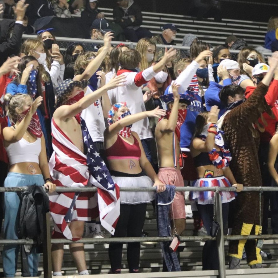 The PV student section cheering on the football team during the Sept. 11 game against Muscatine.