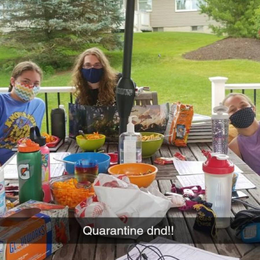 Pleasant Valley students mask up and go outside to play Dungeons and Dragons during quarantine. 
