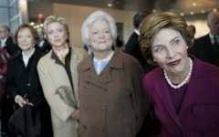Four former first ladies--from left to right, Rosalynn Carter, Hillary Clinton, Barbara Bush, and Laura Bush--stood together during the opening of the Clinton Presidential Center in 2004. 