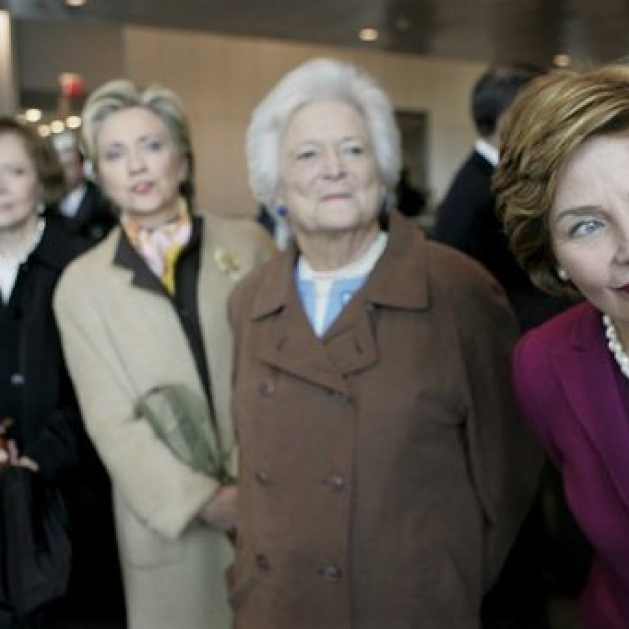 Four former first ladies--from left to right, Rosalynn Carter, Hillary Clinton, Barbara Bush, and Laura Bush--stood together during the opening of the Clinton Presidential Center in 2004. 