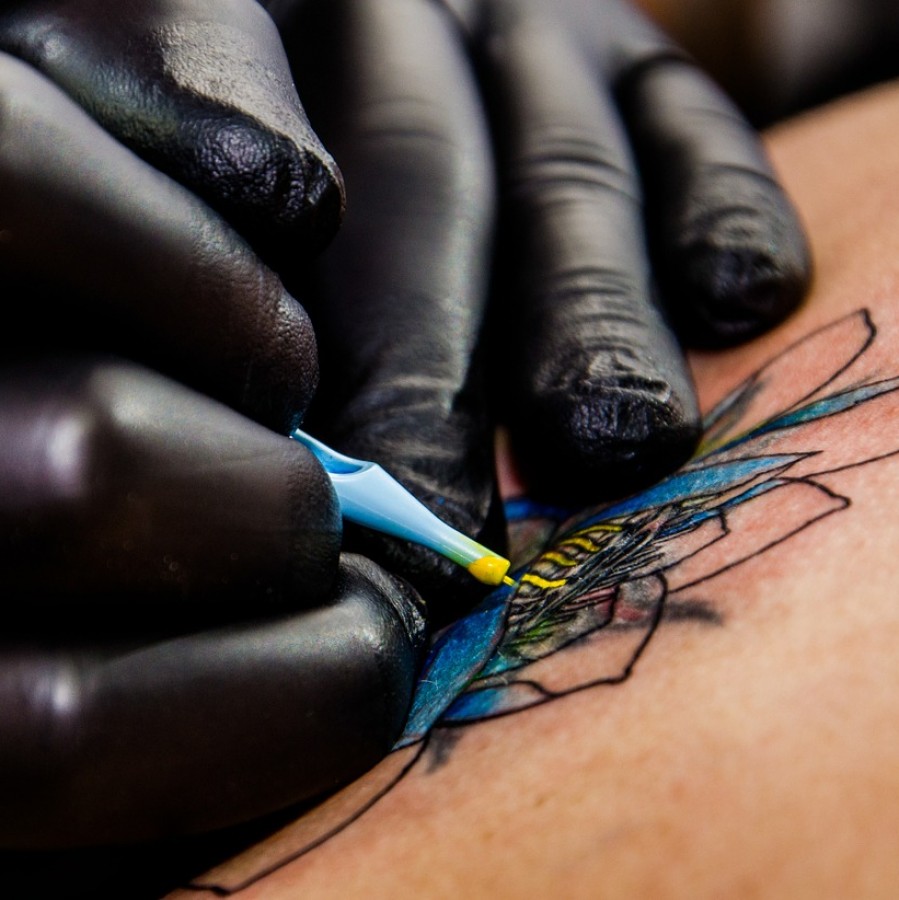 Professional tattoo artists often create meaningful works of art in black and white or with radiant colors.