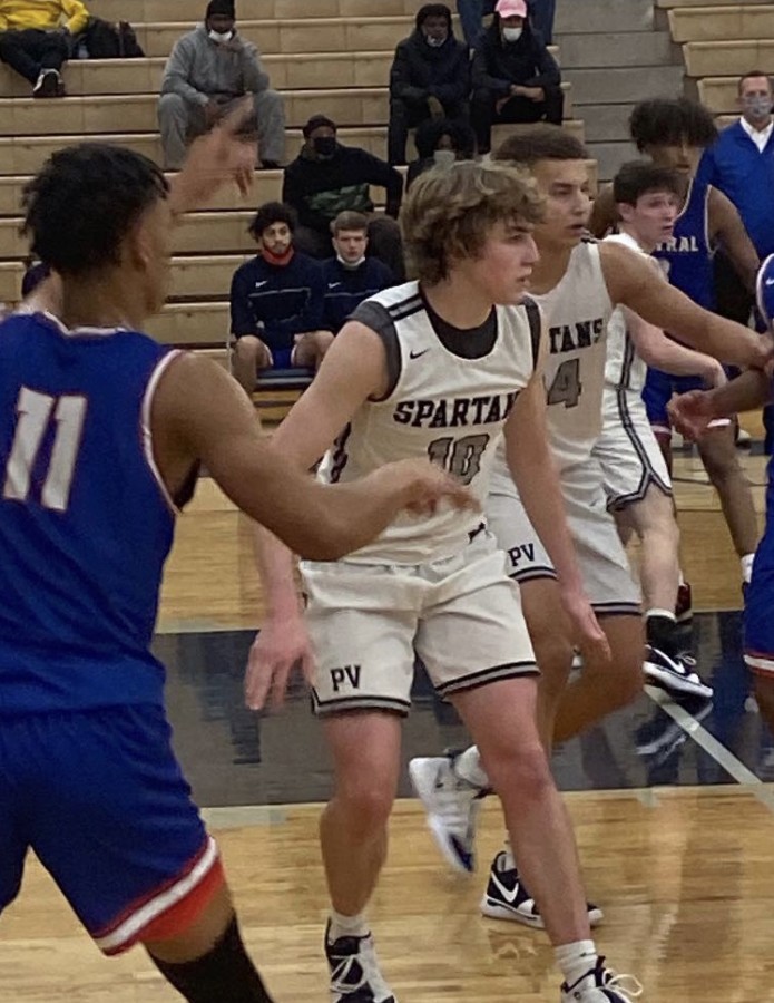 Joey Borbeck plays defense in the Spartans game against the Davenport Central Blue Devils on Friday night