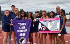 The 2018-2019 varsity girls tennis team celebrates after beating rivals Bettendorf 5-0, securing their placement at the state competition. Pictured is (back row, left to right)  Brett Ahlgren, Eric Crawford, (front row, left to right) Julia Hillman, Bel Goedert, Sakshi Lawande, Eesha Lawande, Kayla Nutt, Lauren Hird, Aabha Joshi and Ramya Subramaniam.
