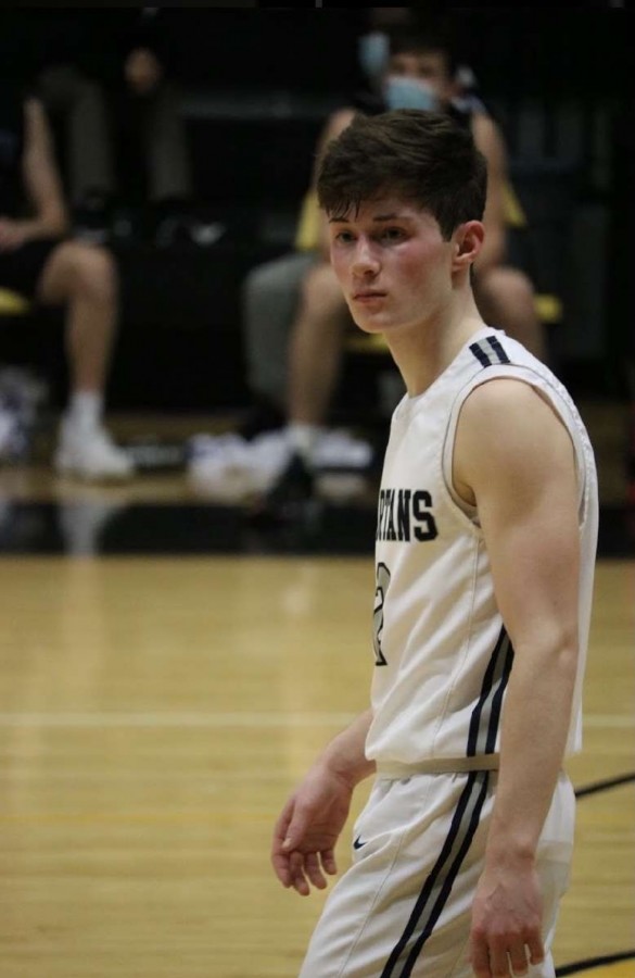 Ryan Dolphin walking down the court during the PV boys basketball team’s Substate Final game against Iowa City Liberty