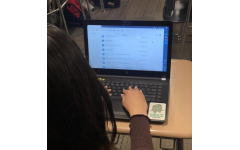 Muskan Basnet opening up her google classroom of missing assignments. 