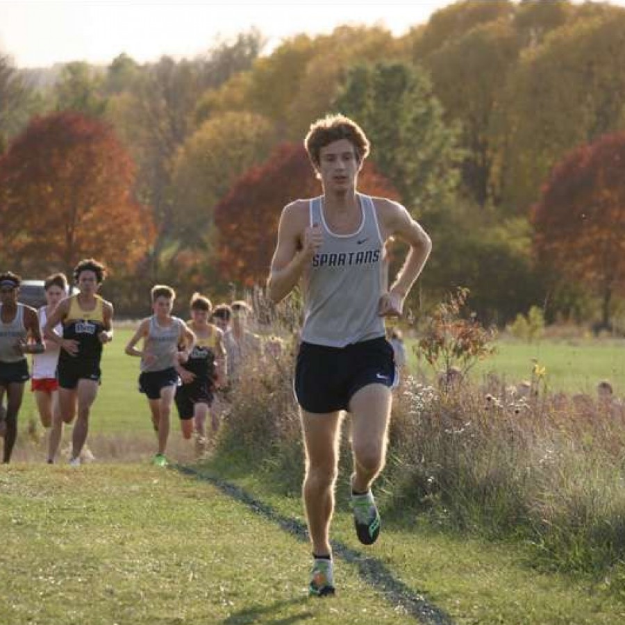 Senior Kole Sommer runs in a cross country meet for the Pleasant Valley Spartans.
