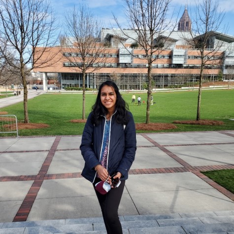 Ramya Subramaniam stands in front of the Clough Undergraduate Learning Commons at the Georgia Institute of Technology. She and fellow senior Owen Jones will be participating in Georgia Tech’s Grand Challenges Living and Learning Community.