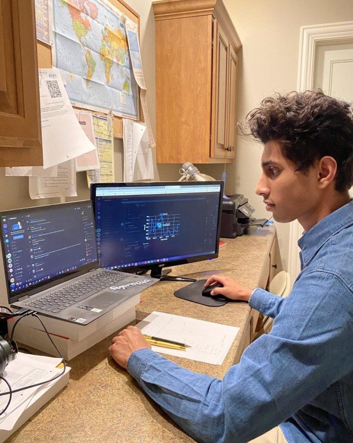Junior Vinay Joshi working on his business, AIOResailors through the software CyberAIO