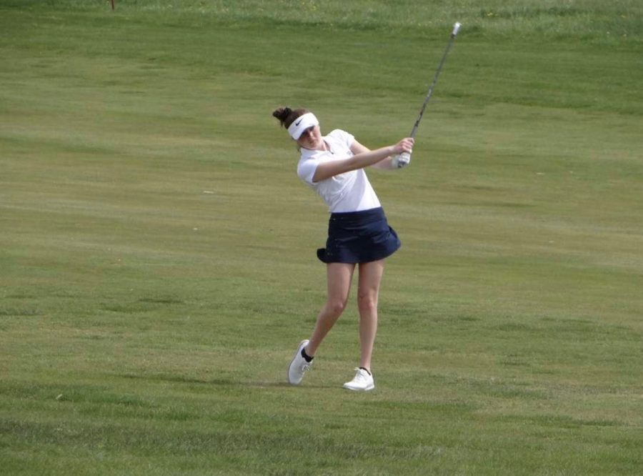Junior Erika Holmberg at a golf tournament after missing her last golf season.