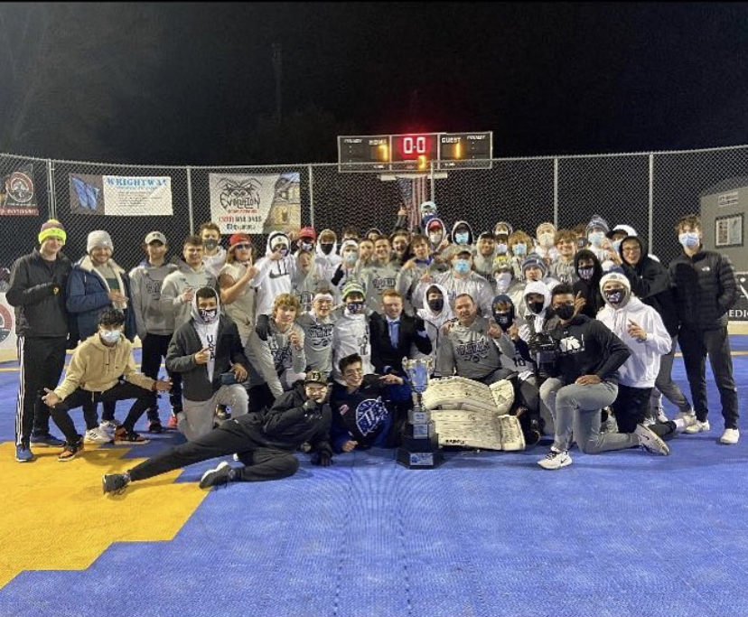 The Spartan Dek hockey team poses for a photo following their 22-0 season. 